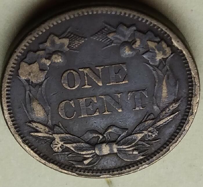 1857-Flying-Cent---Strange-Rim-Reverse